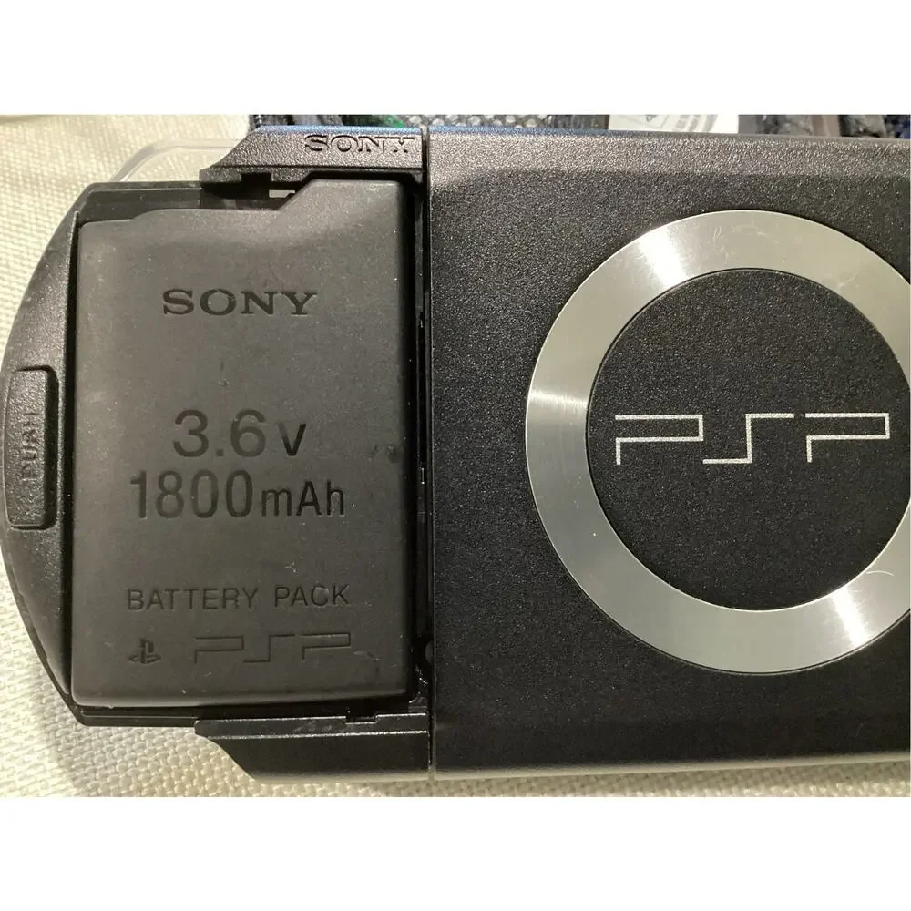 Sony PSP 2001 Black Handheld Console Bundle w/ Charger, Case, Manual & 5 Games